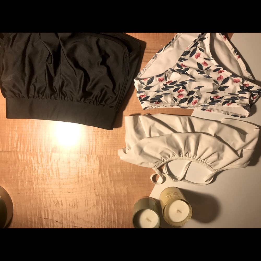 3 girls swimsuits and black athletic swim shorts to match